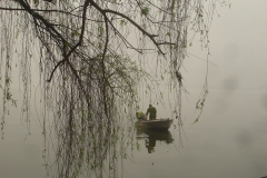 Vietnam, bateau dans la brume